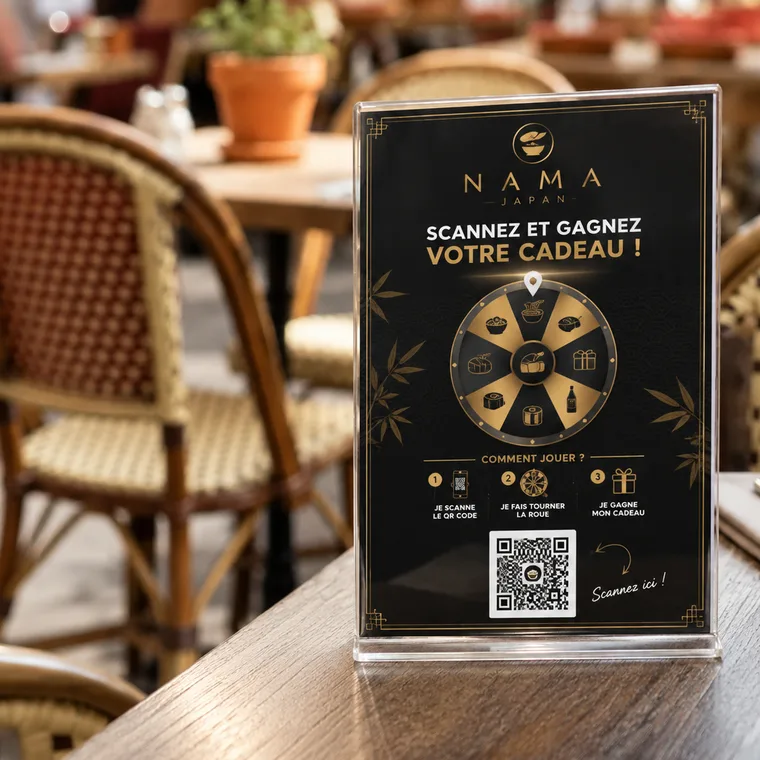 Chevalet de table SpinBoost avec sa roue de jeu, posé bien en vue dans un établissement